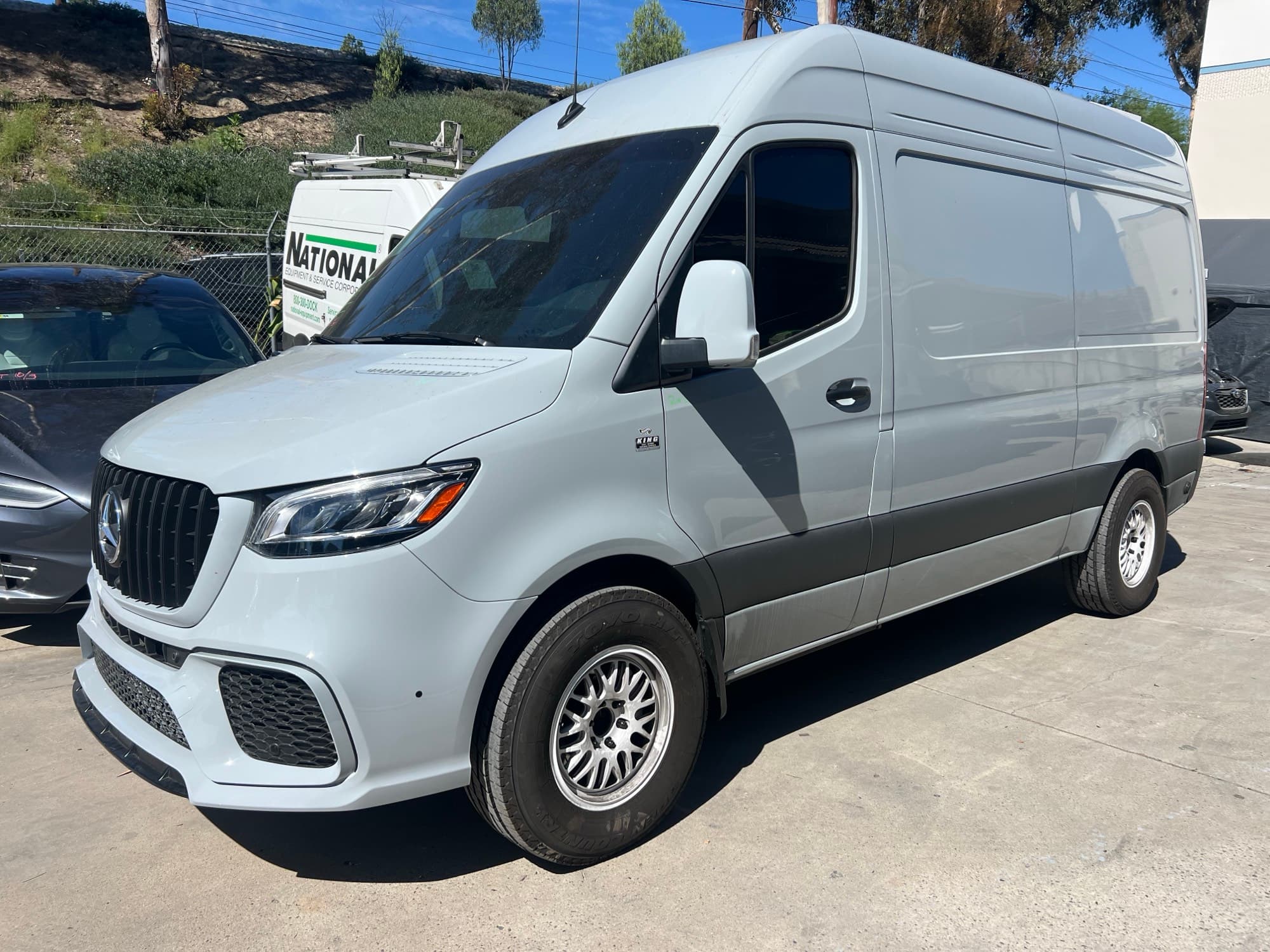 White Mercedes Sprinter van finished and ready for pickup at Crash Lab